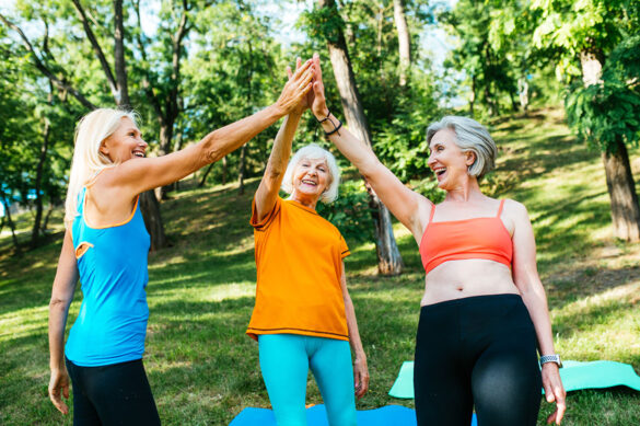 Active senior women doing fitness in a park